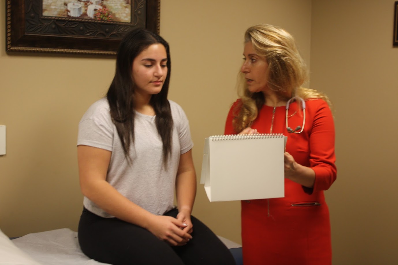 Modern oncology consultation and exam room at North Houston Cancer Clinics