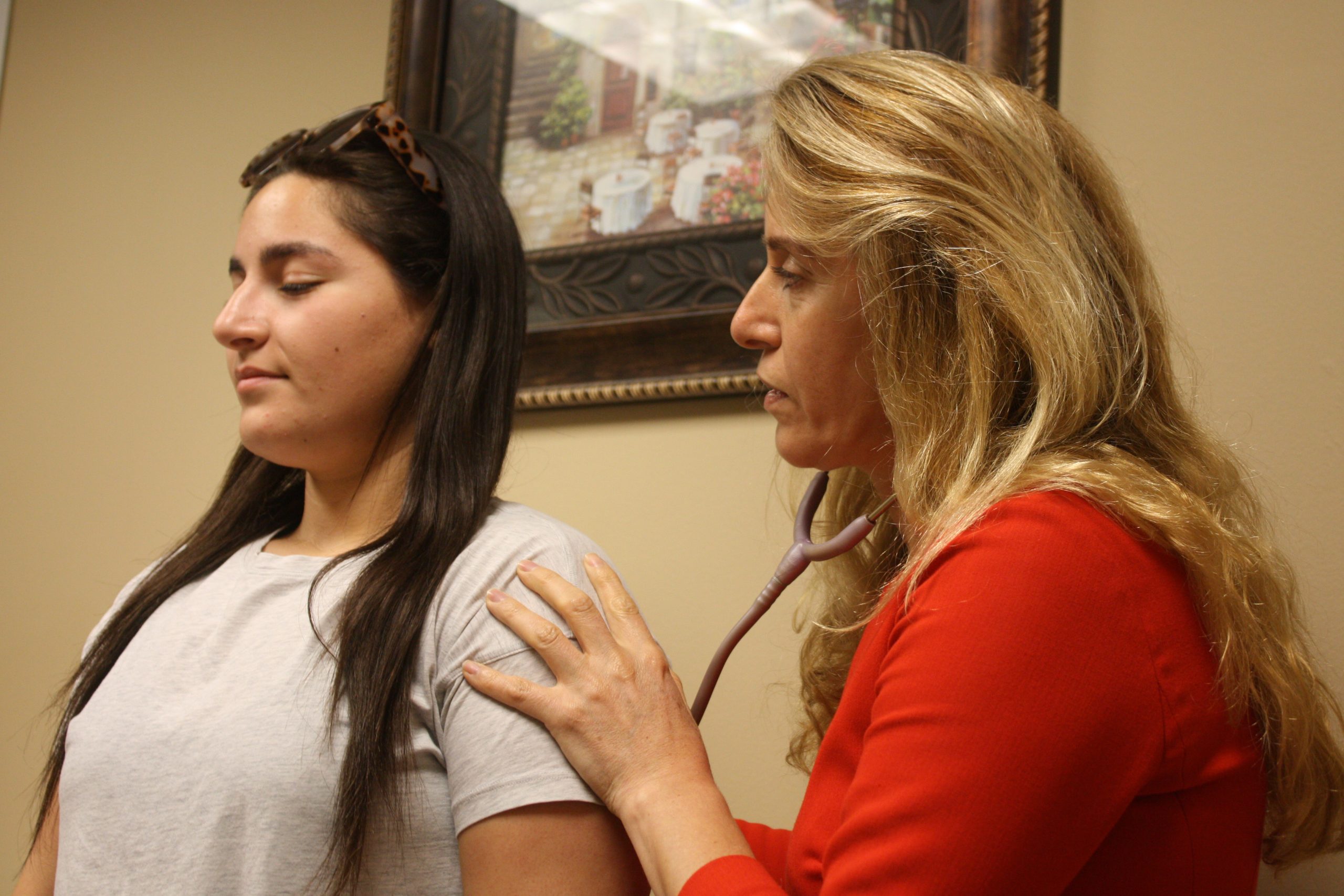 Modern oncology consultation and exam room at North Houston Cancer Clinics