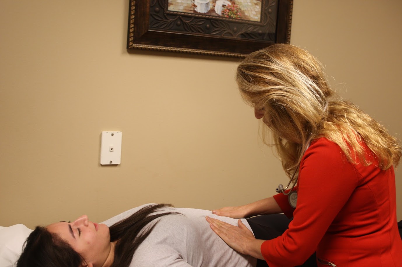 Modern oncology consultation and exam room at North Houston Cancer Clinics